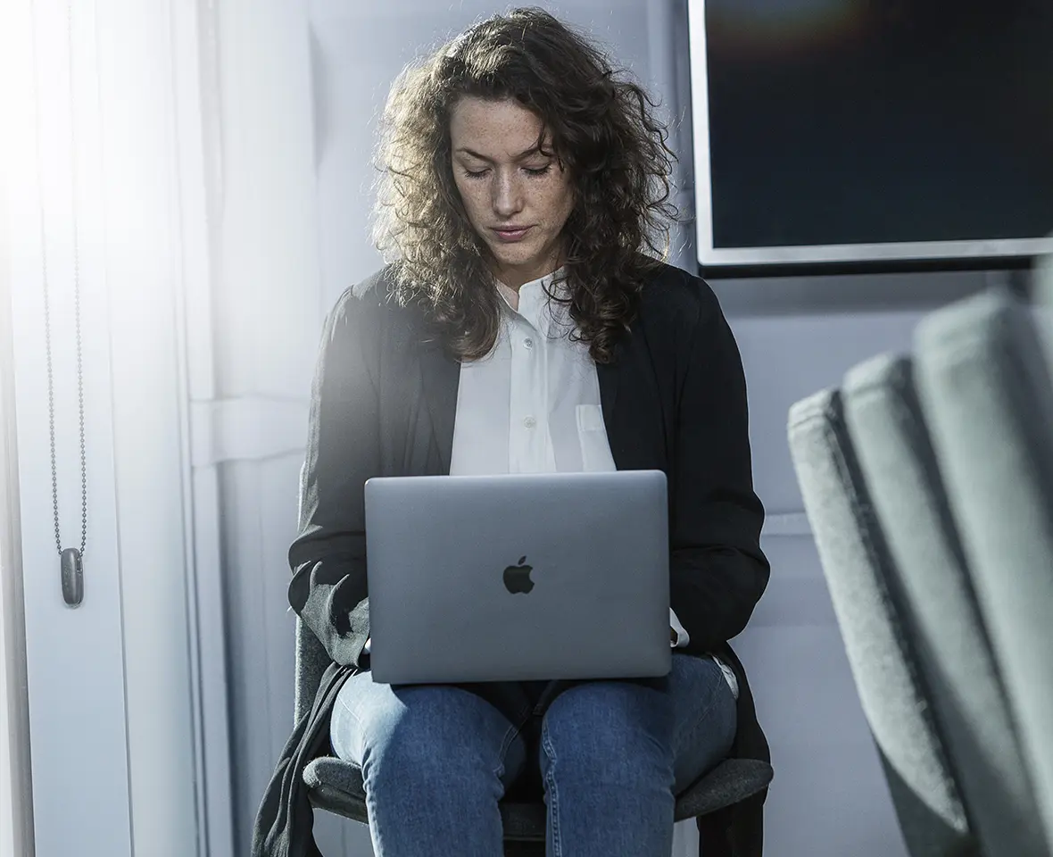 Apple MacBook Pro and Female in enterprise environment
